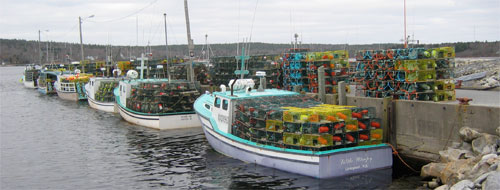 Lobster fishermen ready their boats for the start of the season