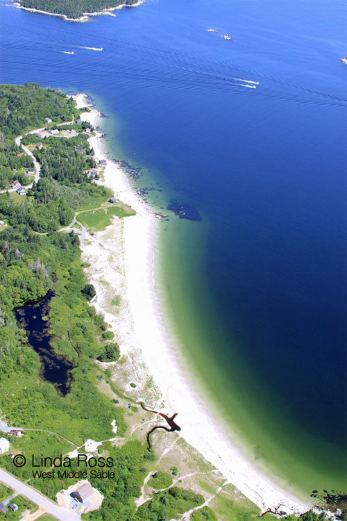 View of SouthWest Beach and fishing boats enroute.